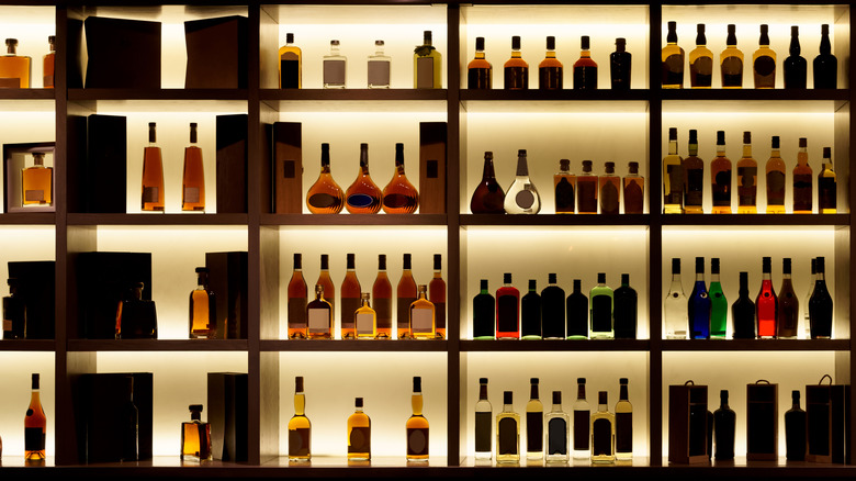 liquor bottles on bar shelves