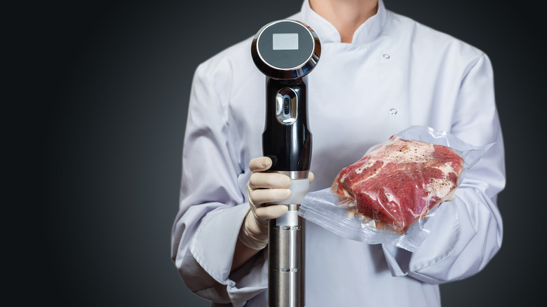 Chef holding sous vide machine