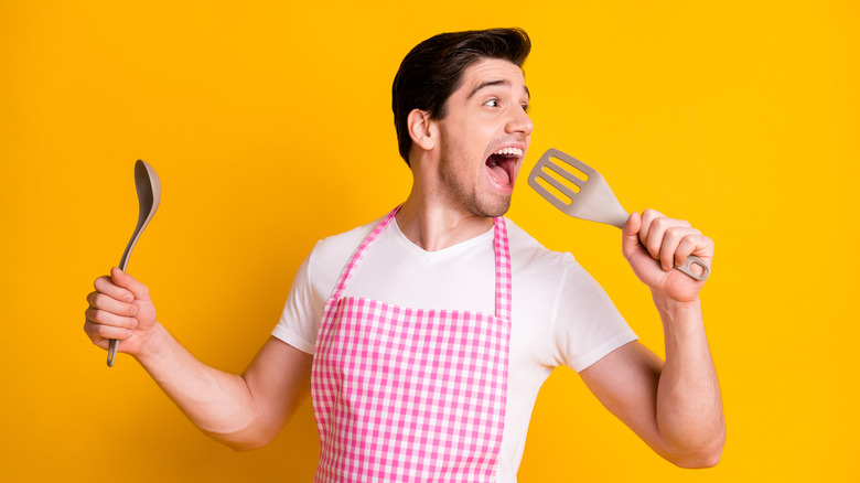 Man holding a spatula