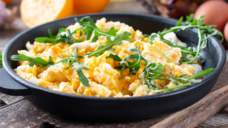 scrambled eggs in cast iron pot