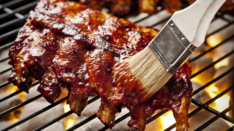 Barbecue sauce brushed over ribs