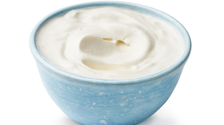 Sour cream in a blue bowl