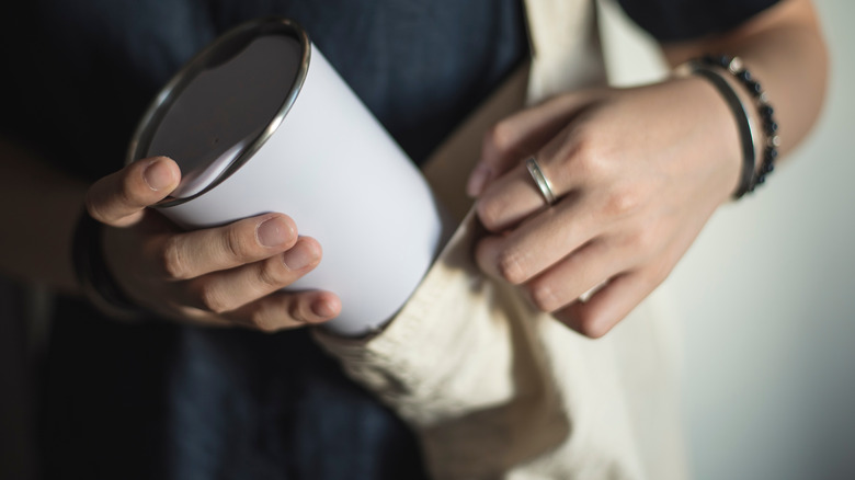 Travel mug placed in bag