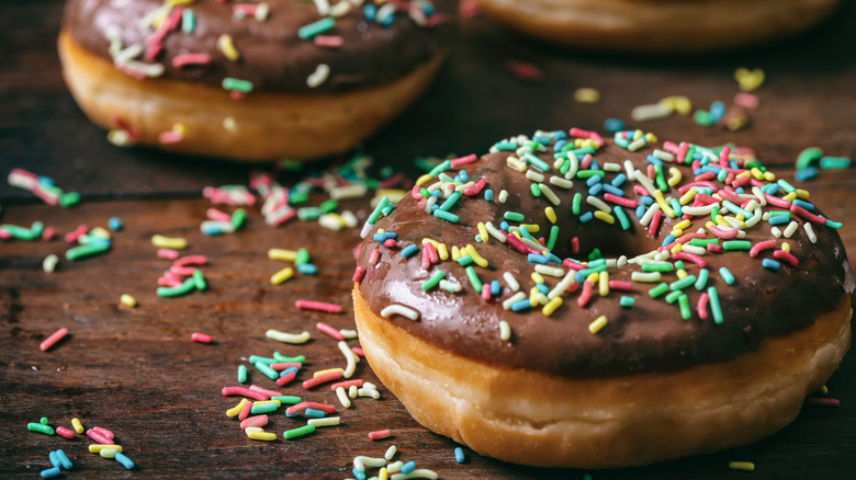 chocolate frosted donut with sprinkles