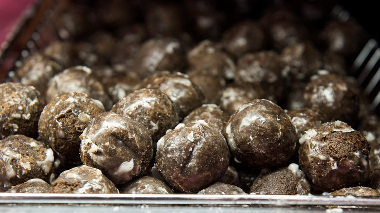 basket of glazed chocolate donut holes