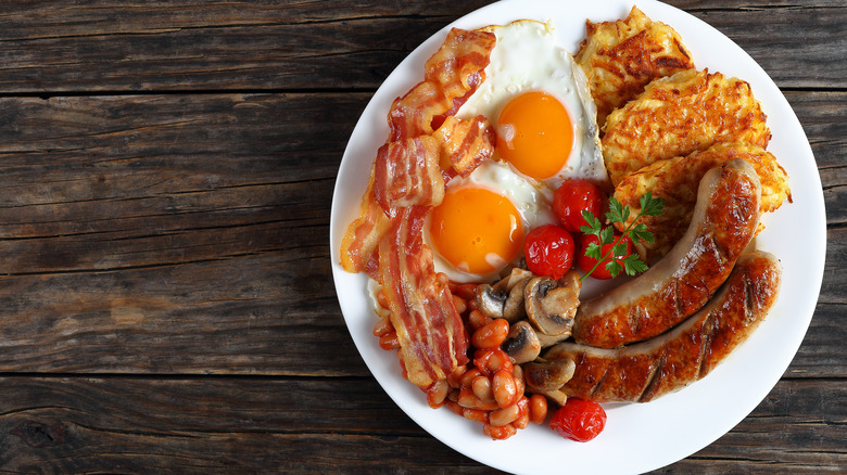 English breakfast with sunny-side up eggs