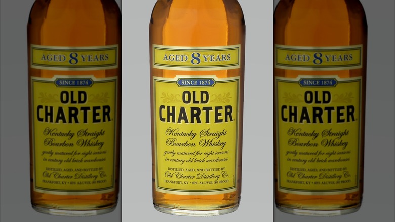 Bottle of Old Charter on grey background