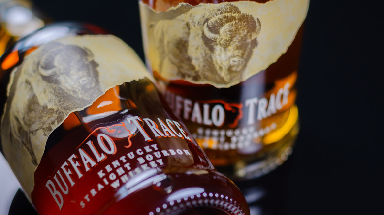 Two bottle of Buffalo Trace, one standing, one on the side