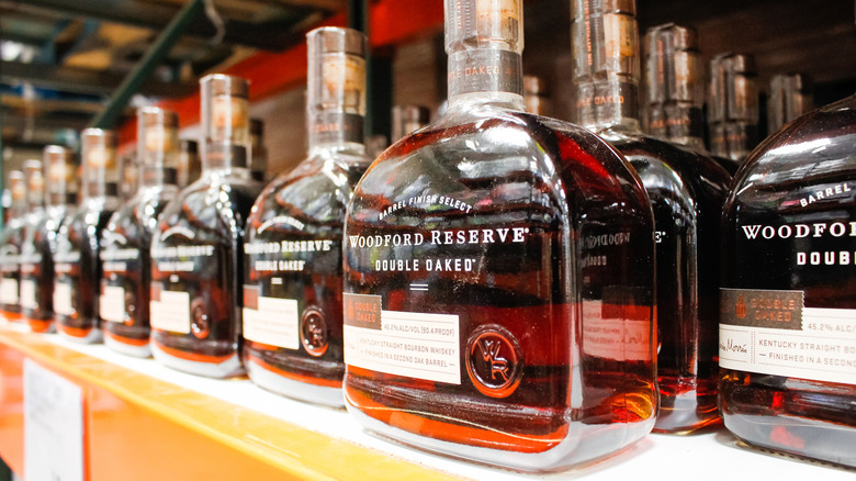 A row of Woodford Reserve double oaked bottles
