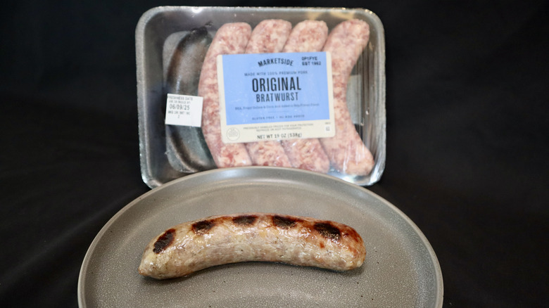 Marketside bratwurst on plate next to package