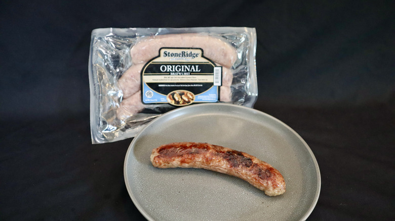 StoneRidge bratwurst on plate next to package