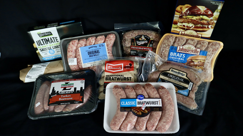 Multiple packages of brats on black background