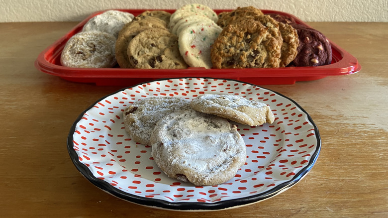 plated butter pecan cookies in front of cookie tray