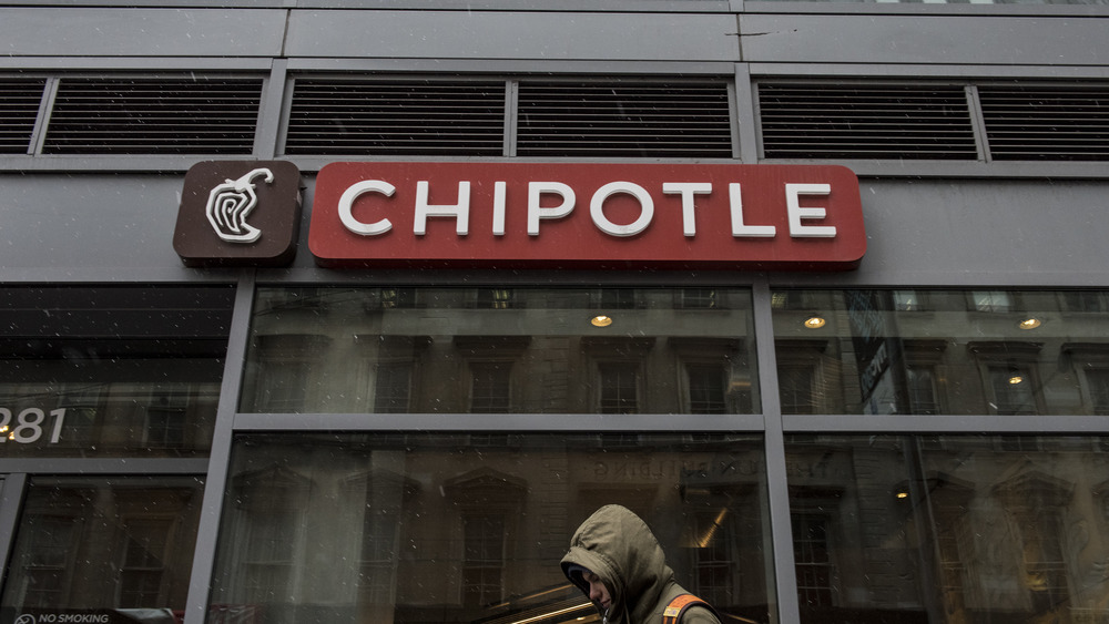 For the foreseeable future, the Chipotle sign, hanging over you ominously, will be as close as you can get to the hollowed grounds of burrito-land. Understand the sorrow of the foregrounded man whose face is downcast. Is life worth living? ... Porbably.