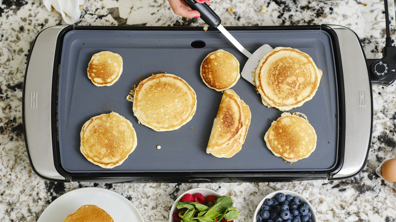 cooking pancakes on griddle