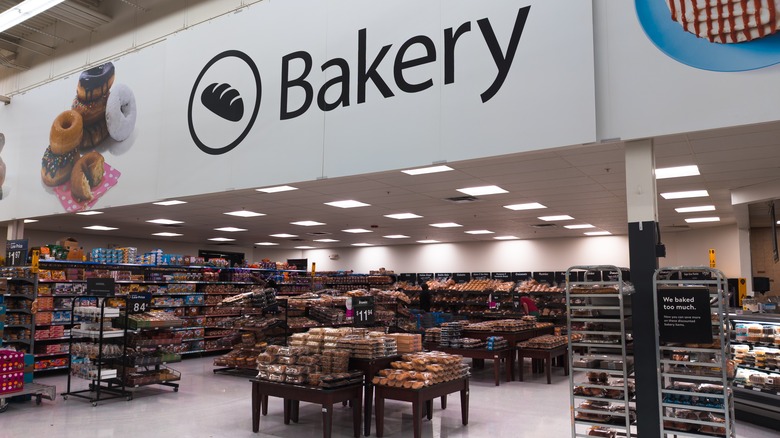 Bakery sign above the baked goods on shelves at Walmart