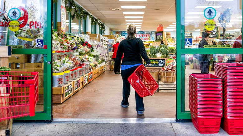 shopper entering Trader Joe's store