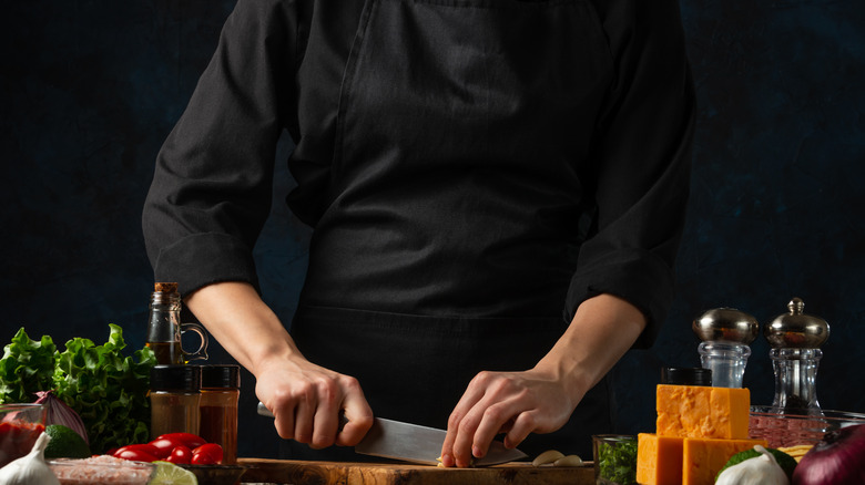 Chef using knife