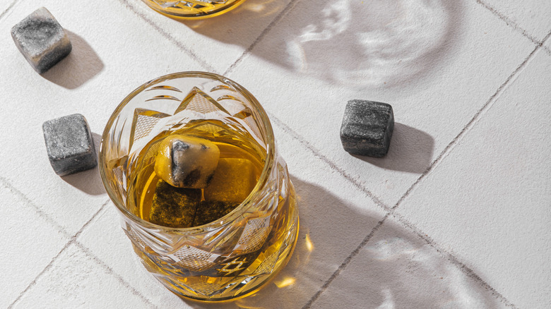 whiskey in glass with whiskey stones