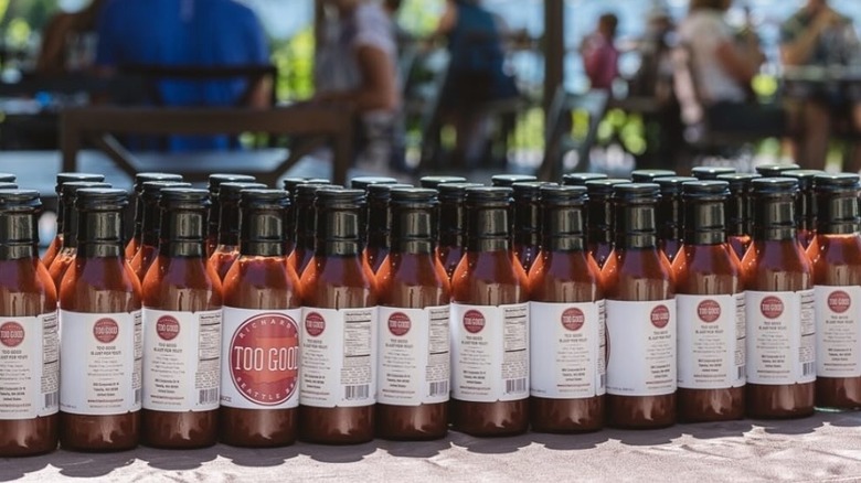 lineup of Richard's Too Good sauce bottles