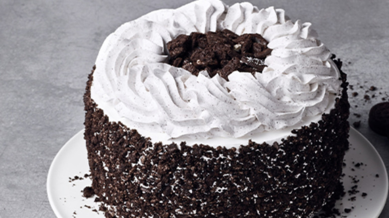 Cookies and creme cake with cookies in background