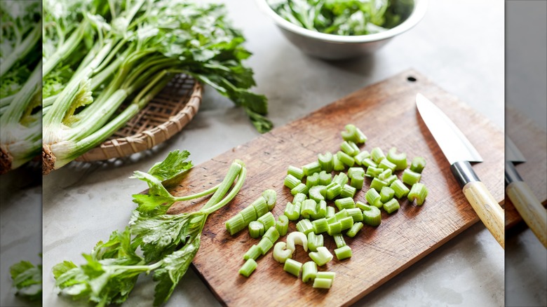 Chopped celery on cutting board