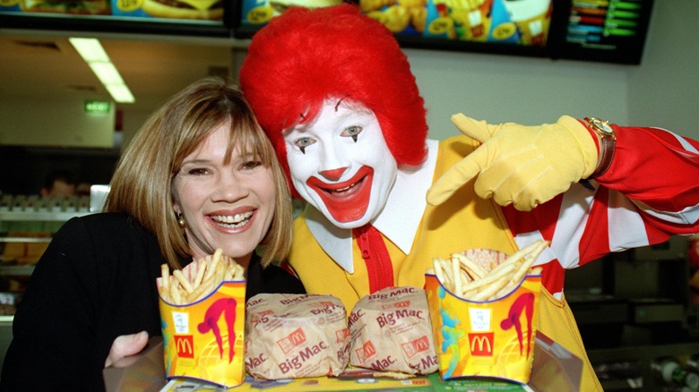 Ronald McDonald poses with Big Macs