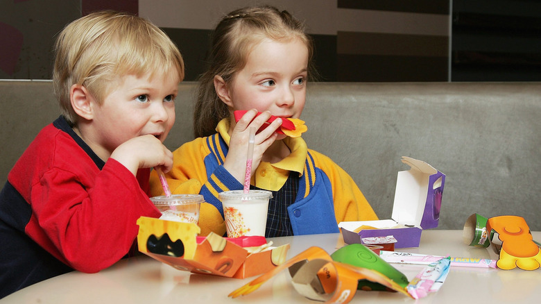 children eating a Happy Meal