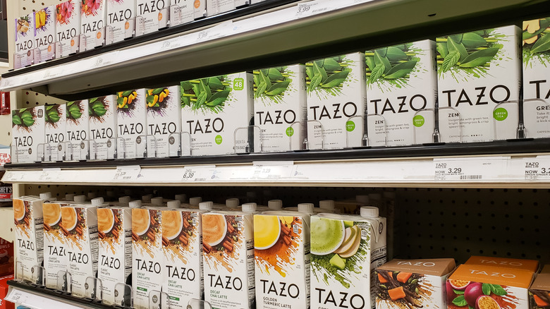Tazo tea products line grocery store shelves.