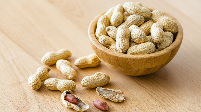 A bowl of peanuts in the shell