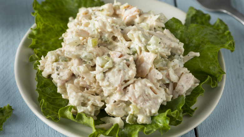 Chicken salad on a lettuce leaf on a plate