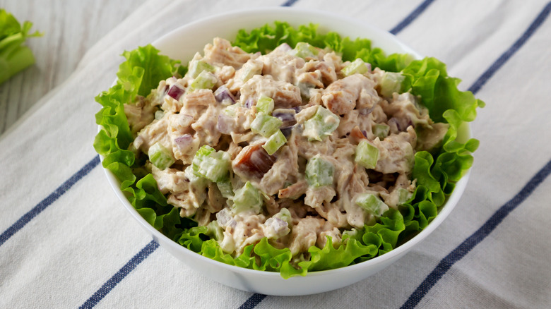 chicken salad on lettuce in a bowl