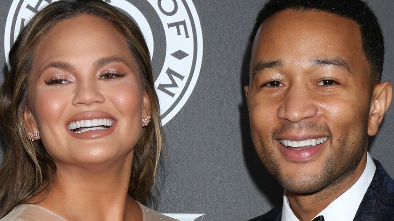 Chrissy Teigen and John Legend on red carpet