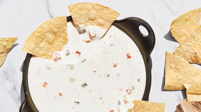 chips in and around queso
