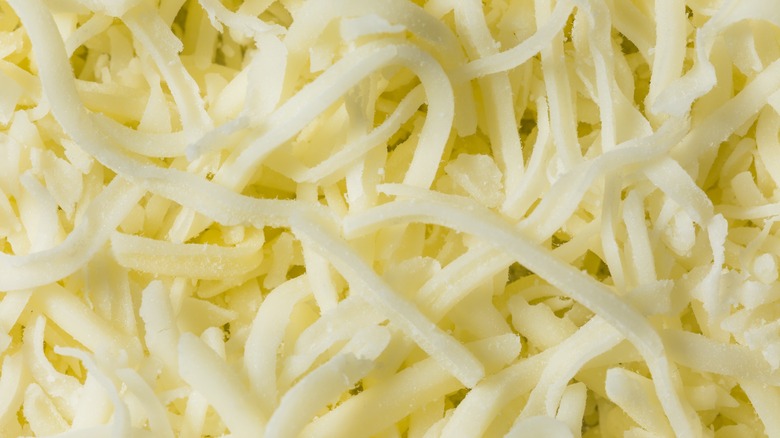 Close-up of shredded mozzarella cheese