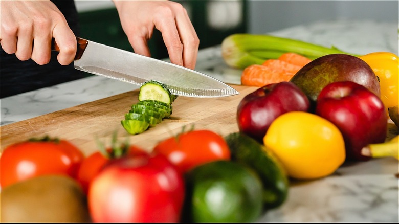 cutting zucchini with a chef knife