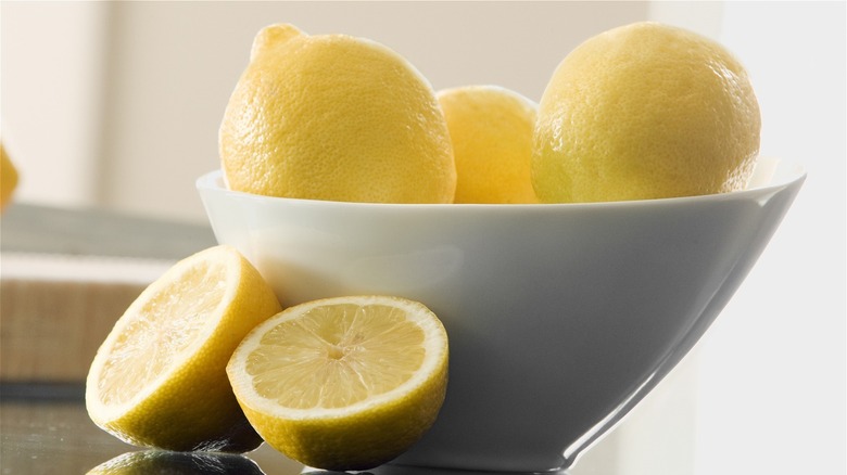 lemons in white bowl
