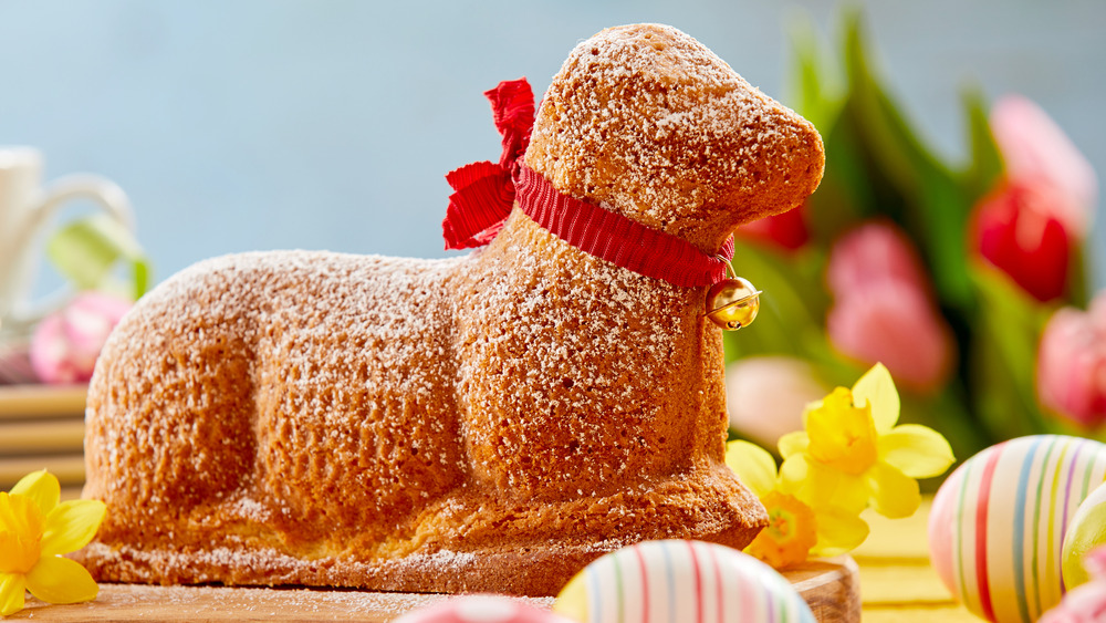 Classic Easter lamb cake with red ribbon