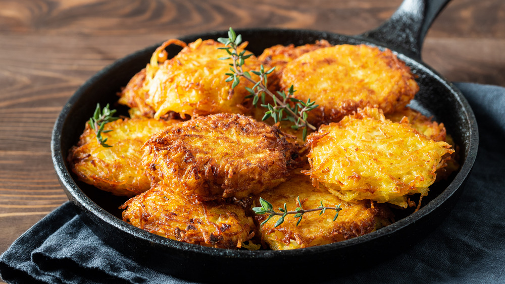 pan filled with latkes