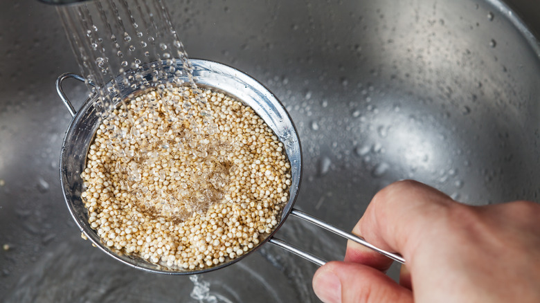 Rinsing quinoa in sieve