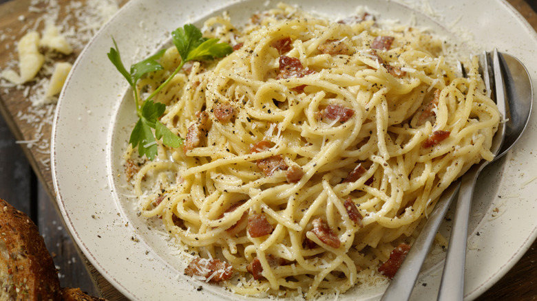spaghetti carbonara with fresh herbs