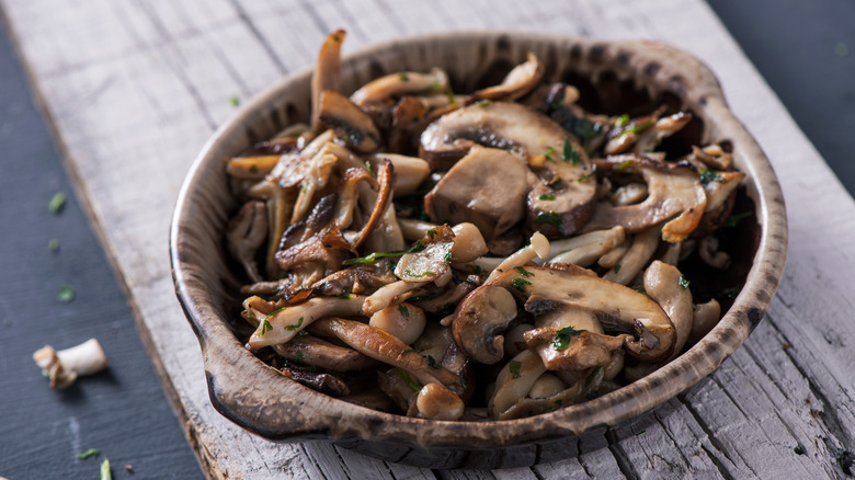 A bowl of cooked mushrooms