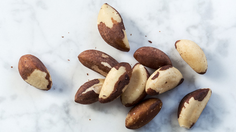 Brazil nuts on a marble table