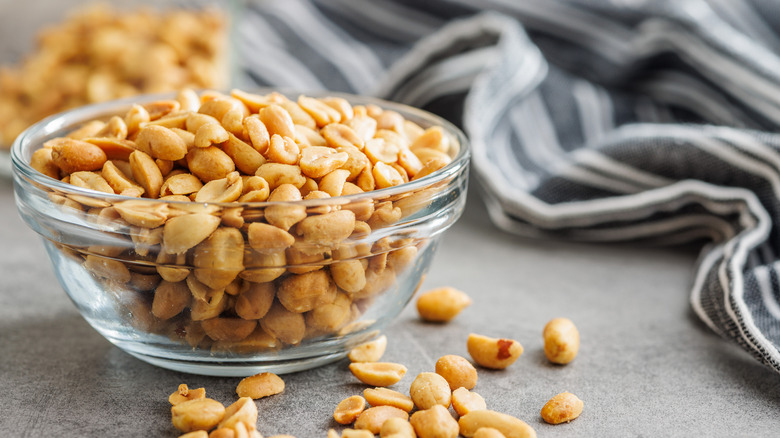Bowl of peanuts in glass bowl