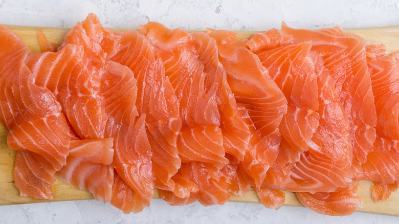 smoked salmon on wooden board