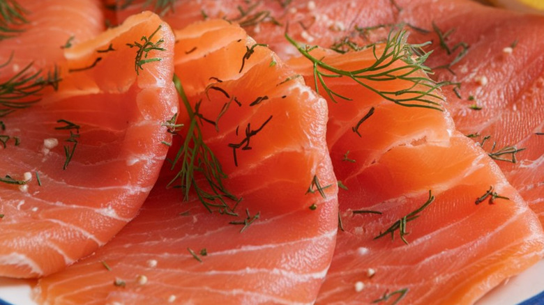 Close-up of smoked salmon with herbs