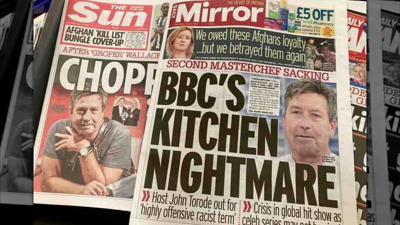 Front pages of the Sun and Mirror with headlines about John Torode being sacked on MasterChef