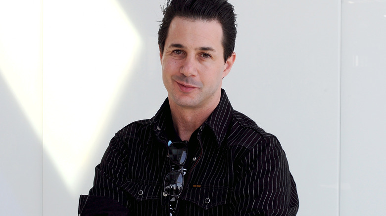 Johnny Iuzzini posing for a photo white background