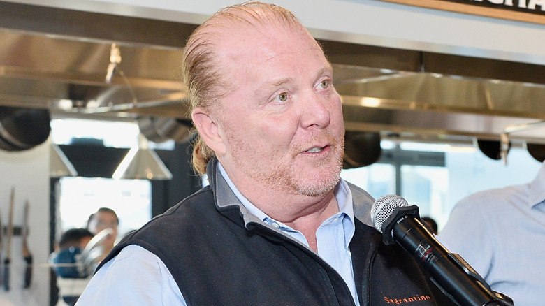Mario Batali speaking into mic