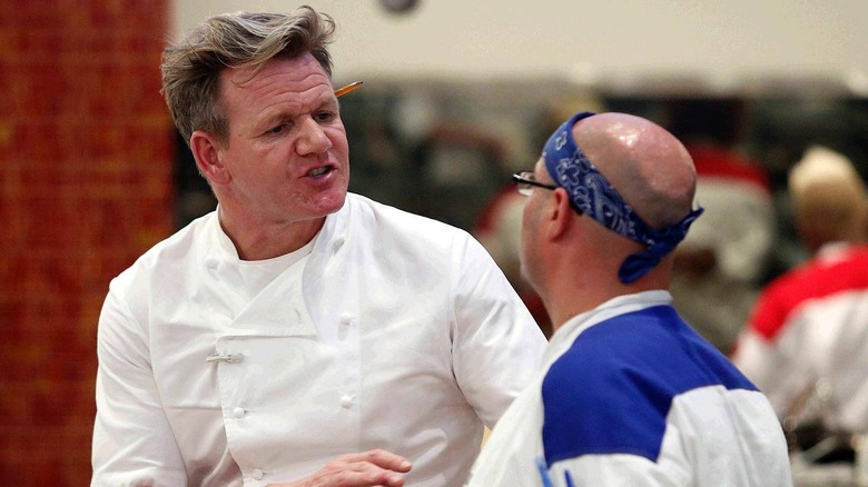 Gordon Ramsay with a contestant